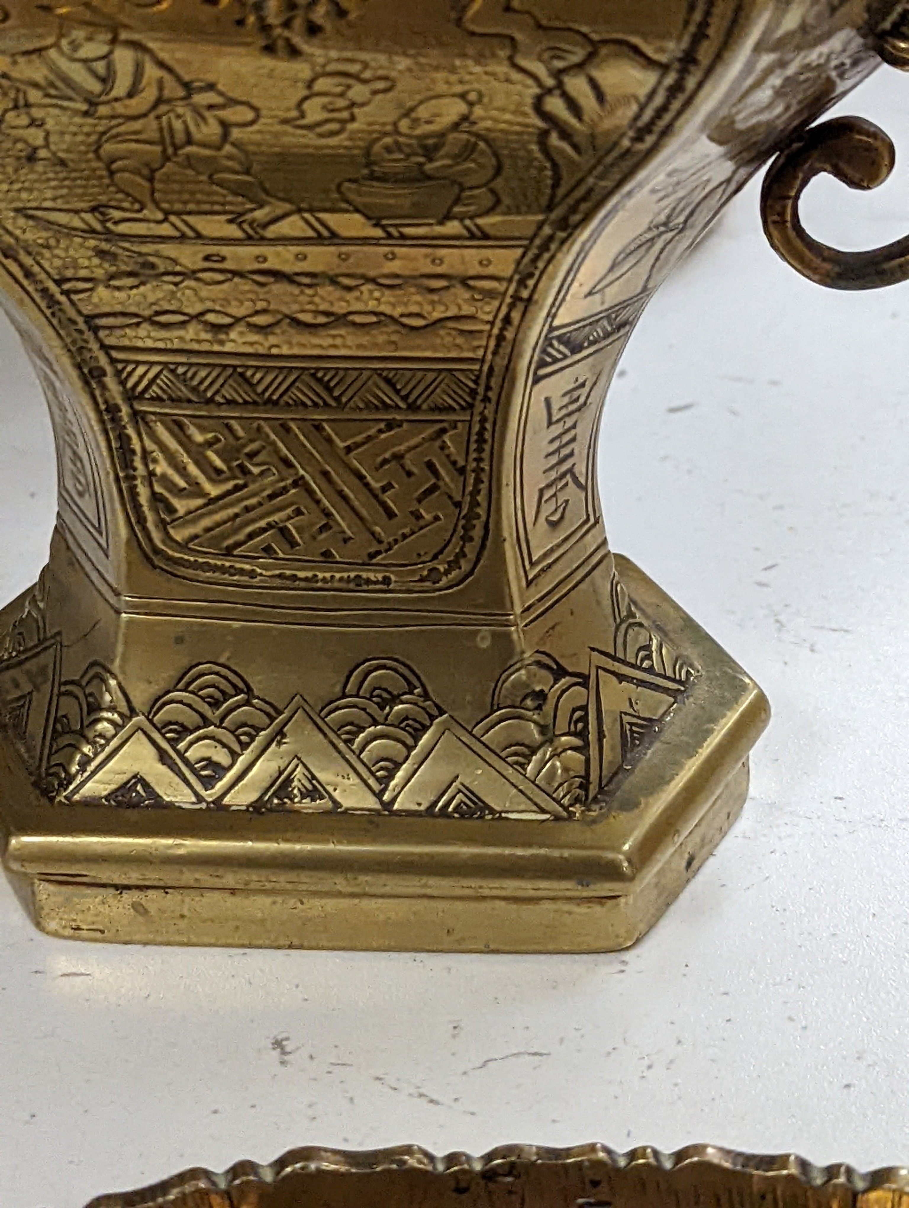 Two early 20th century Chinese bronze vases and a similar tray, 35cm diam.